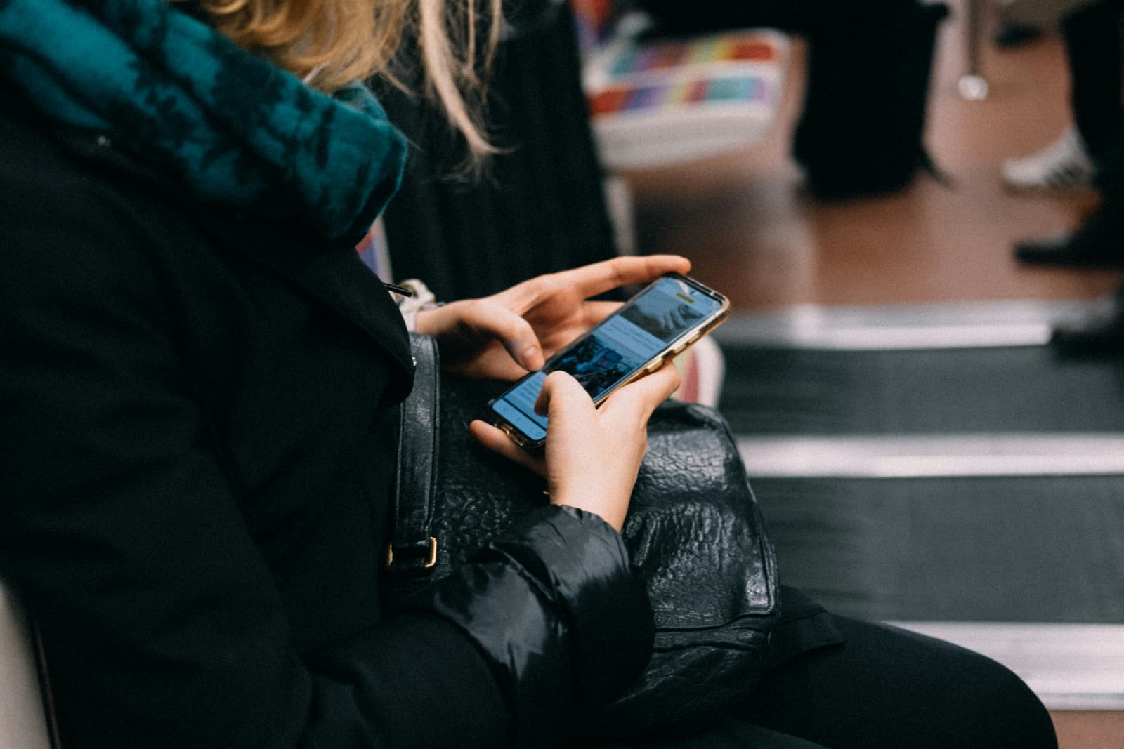 Traveller using a smartphone and connected devices while staying online in Salvador.